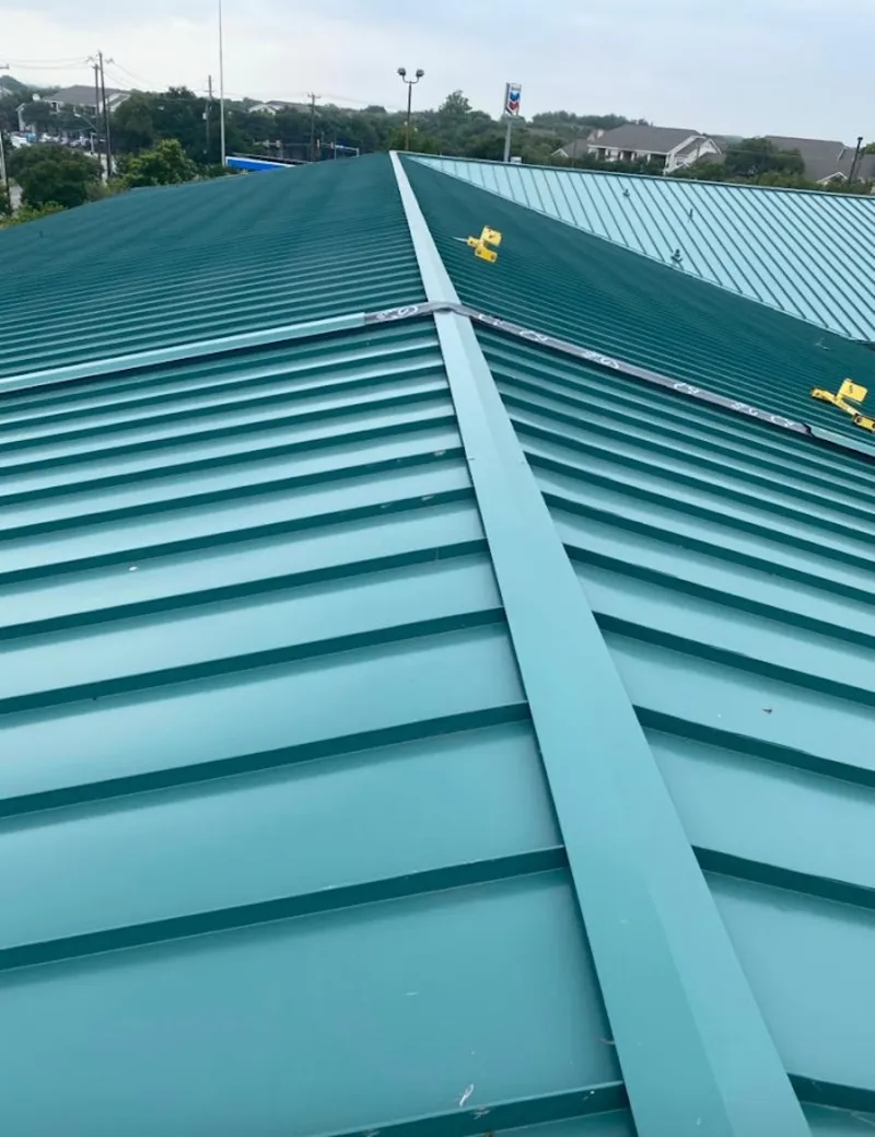 Green commercial metal roof ridge and valley for Metal Roof Repair in Mentor
